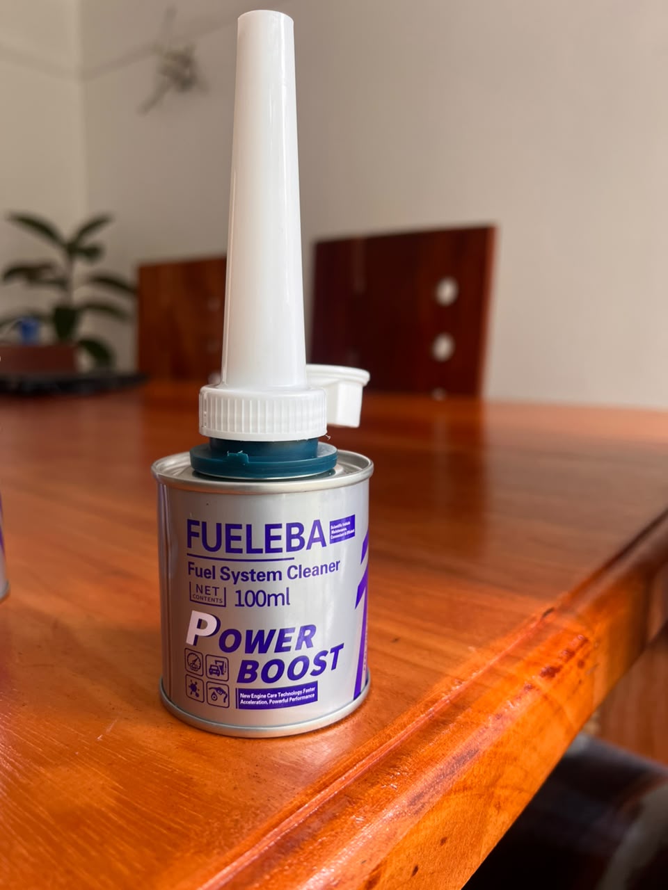 A single can of FUELEBA Power Boost with its spout fitted